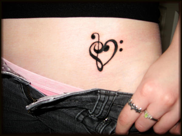 not a broken heart; They are waves from the music heart tattoos for men