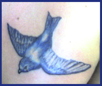 Russ Sparrow - chest tattoo