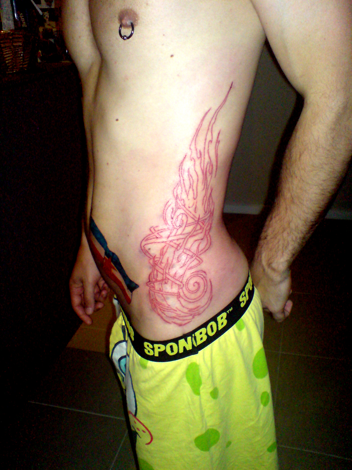 Flames outline - chest tattoo