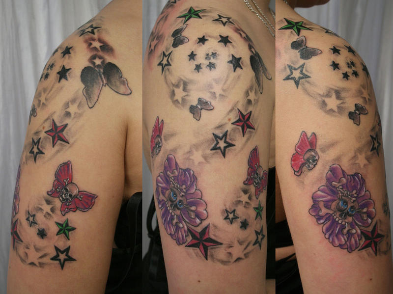 girly skull tattoo designs. butterfly tattoo designs