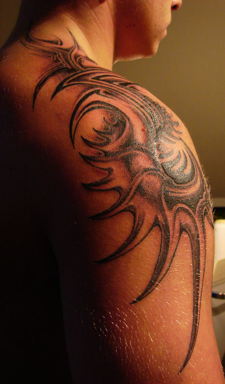 Capricorn tribal 2 shoulder tattoo