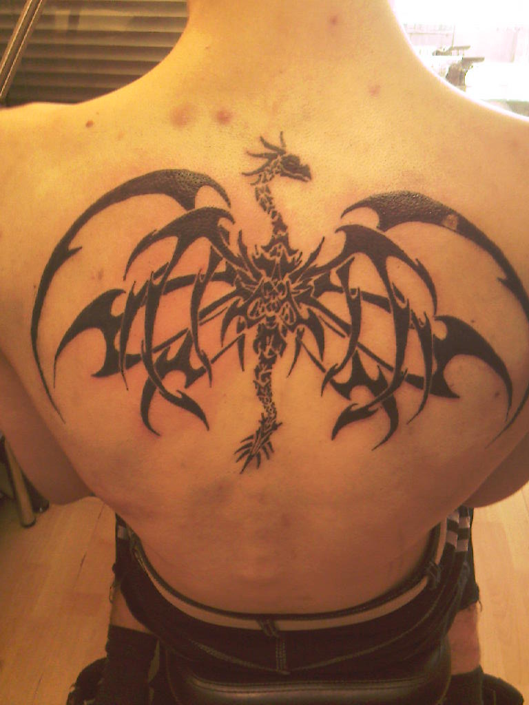 Tribal Dragon Back Tattoo