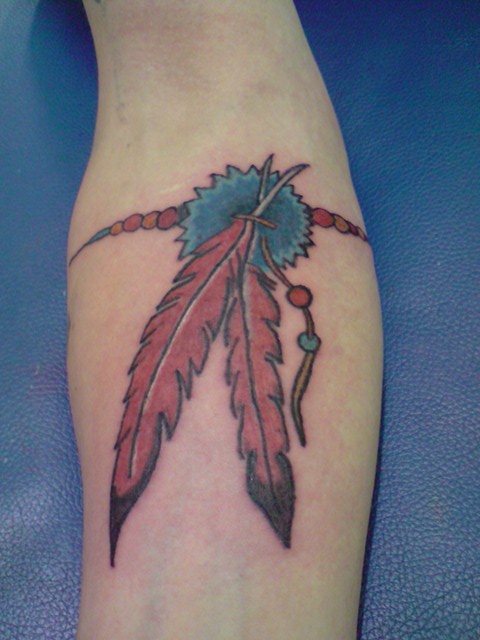 indian feather tattoos. indian feather tattoos. arm