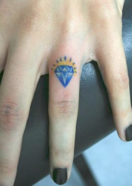 Diamond finger tattoo by NightOwlTattoo