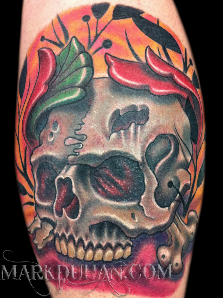 Traditional Skull And Rose Tattoo