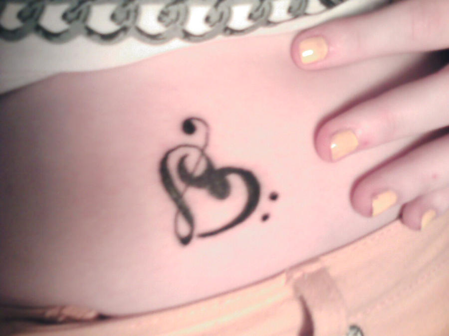 heart tattoos on hip. hip tattoos. Musical Heart