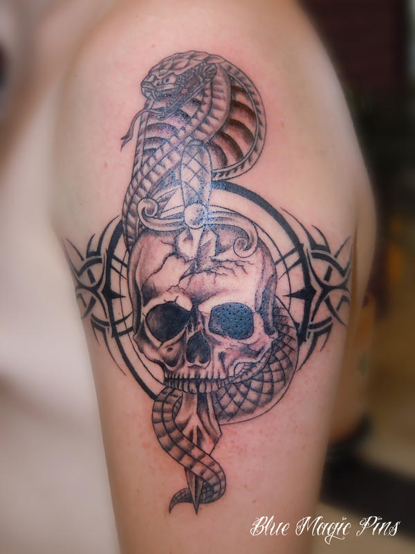 Skull, dagger and cobra - chest tattoo