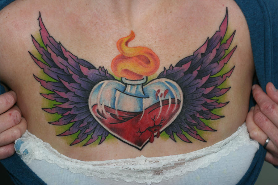 Give my Broken Heart Wings - chest tattoo