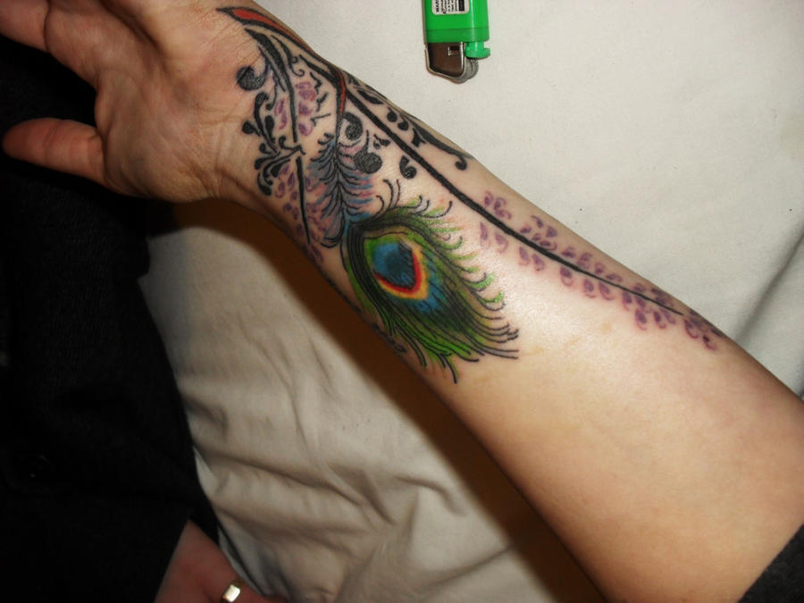 Peacock feather tattoo by Crissixx on deviantART